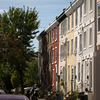 View of row homes on a street.